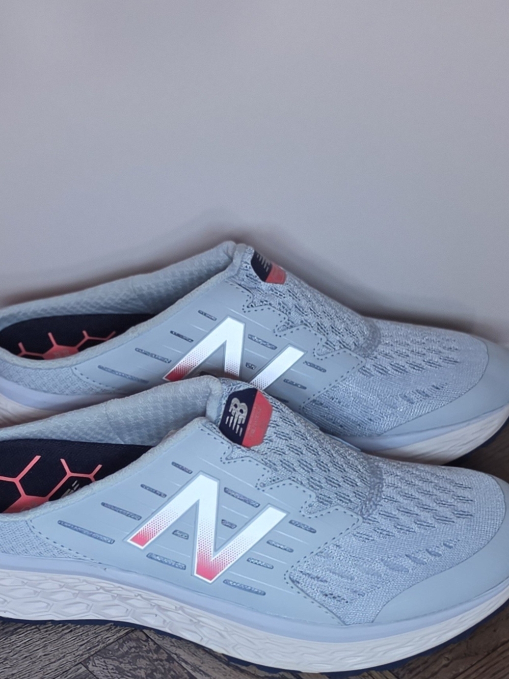New Balance Light Blue Slip-On Running Sneakers with Pink Accents